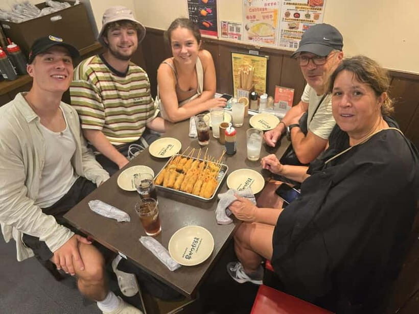 Bite into Shinsekai Discover Osakas Soul Through Every Dish - The Sum Up