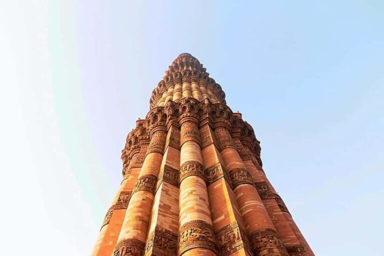 Delhi: Qutub Minar UNESCO World Heritage Site Walking Tour - The Quwwat-ul-Islam Mosque: A Fusion of Traditions