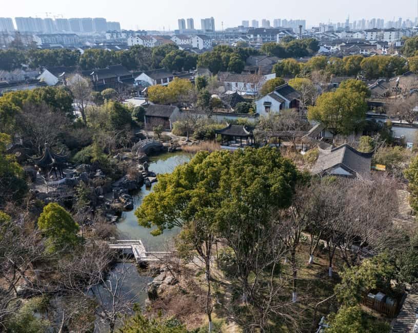 From Shanghai: Luzhi Ancient Town & Suzhou Night Tour - Strolling through Double Tower Market and Dinner