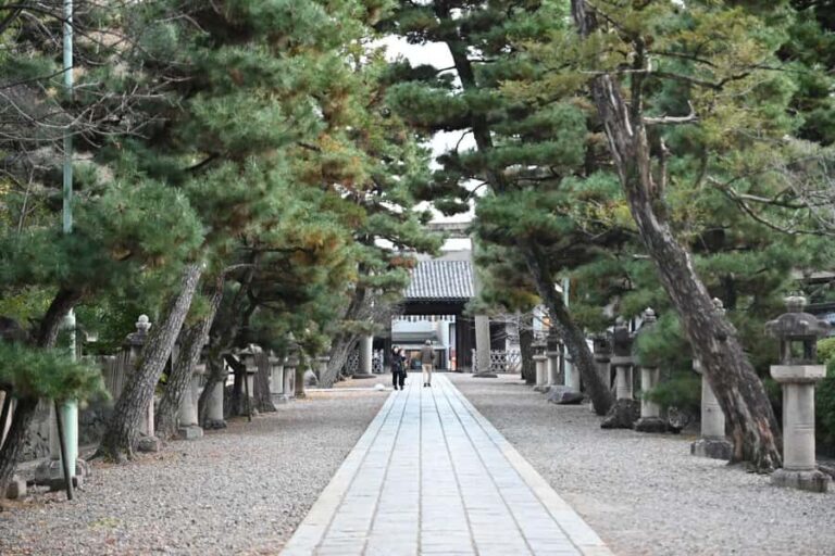 Kyoto: Fushimi Water, Sake, and Sweets Guided Tour - Exploring Gokonomiya Shrine: The Sacred Spring and Historical Roots