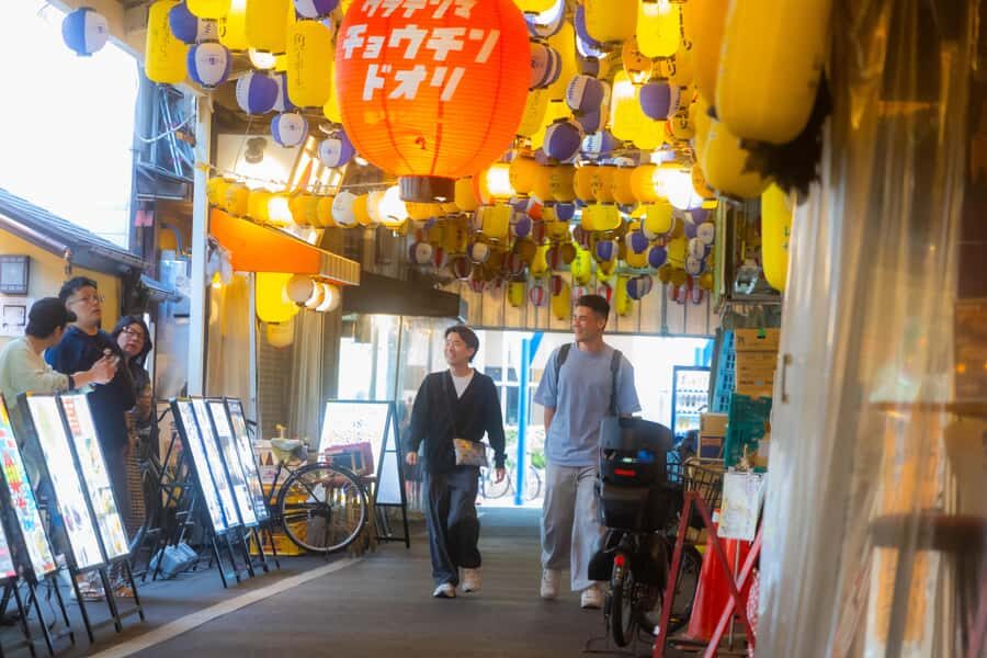 Osaka Night Food Tour: Sacred Shrines to Vibrant Izakayas - The Heart of the Night: Local Food and Community