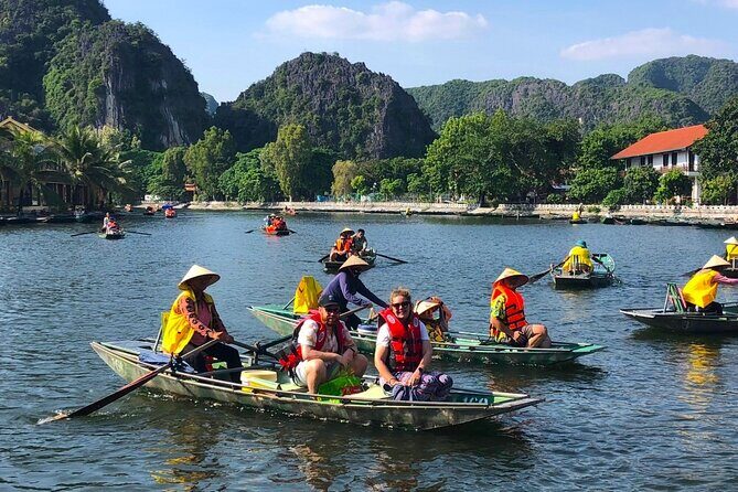 Small Group Discover Hoa Lu, Tam Coc, Mua Caves with Local House - First Stop: Tam Coc and Local Farmer Visit
