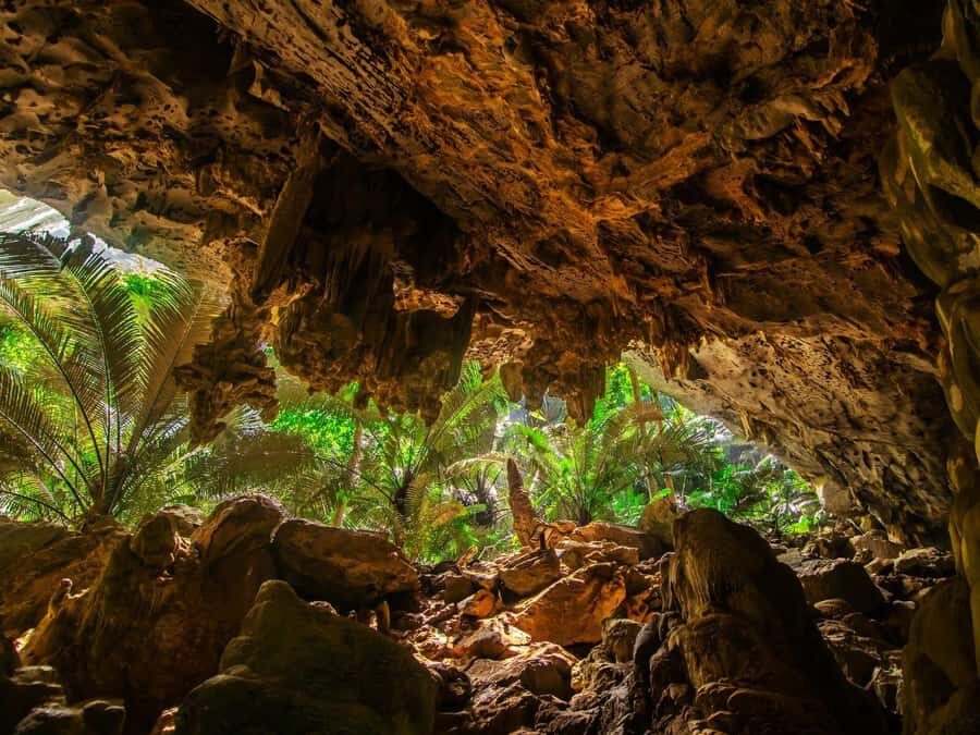 Bangkok: Uthai Thani Day Trip with Floating Temple Visit - Exploring Hup Pa Tard: The Limestone Jurassic Park