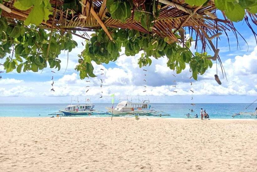 Boracay: Island Hopping Boat Tour with Crystal Cove Entry - Exploring the Itinerary and Main Stops