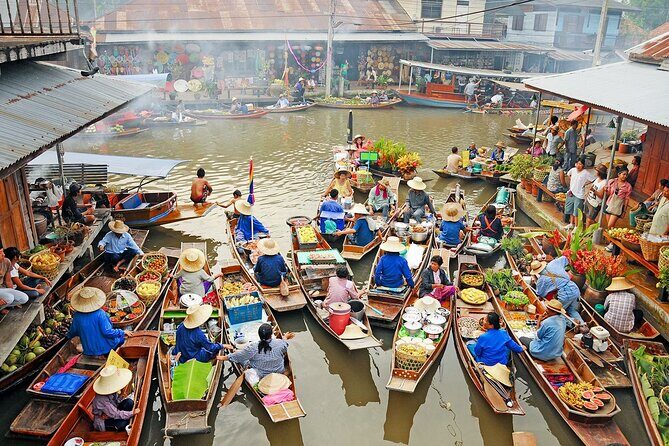 Damnoen Saduak Floating Market & Maeklong Railway Market Day Tour - Maeklong Railway Market: The Real-Life Showstopper