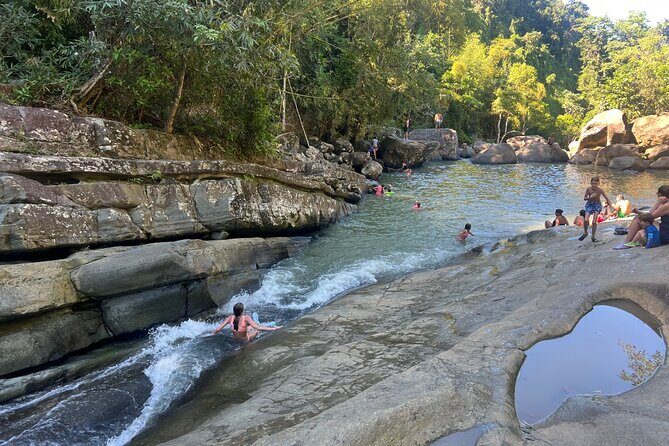 El Yunque Rainforest- Water Slide, Luquillo Beach Guided Tour - Final Stop: Rellenao #40 and the Local Vibe