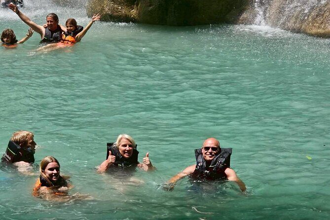 Erawan Waterfall and Kanchanaburi Multilingual Private Tour - The Day Begins: Convenient Pickup & the Scenic Drive to Kanchanaburi