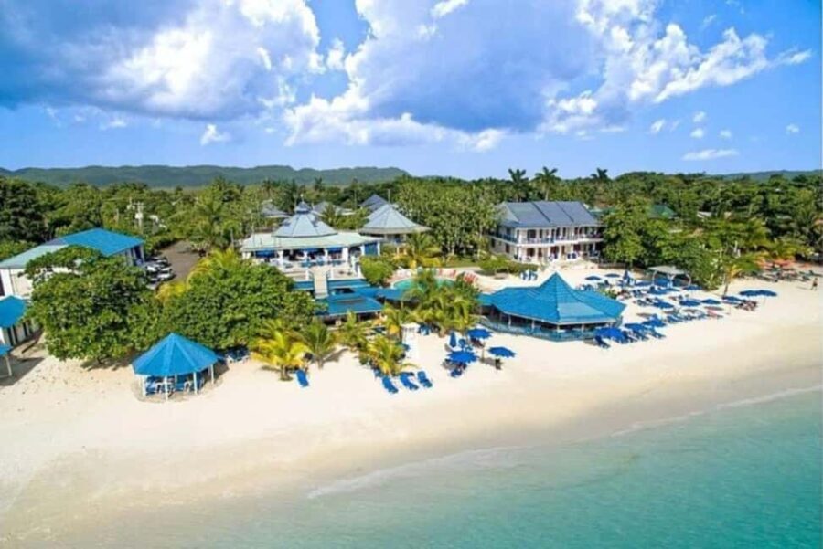 From Montego Bay: 7 Mile Beach and Rick's Cafe Cliff Jump - Transportation & Group Size