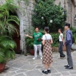Intramuros Walking Tour Old Manila Heritage - Reflective Pause at Plaza de Santa Isabel