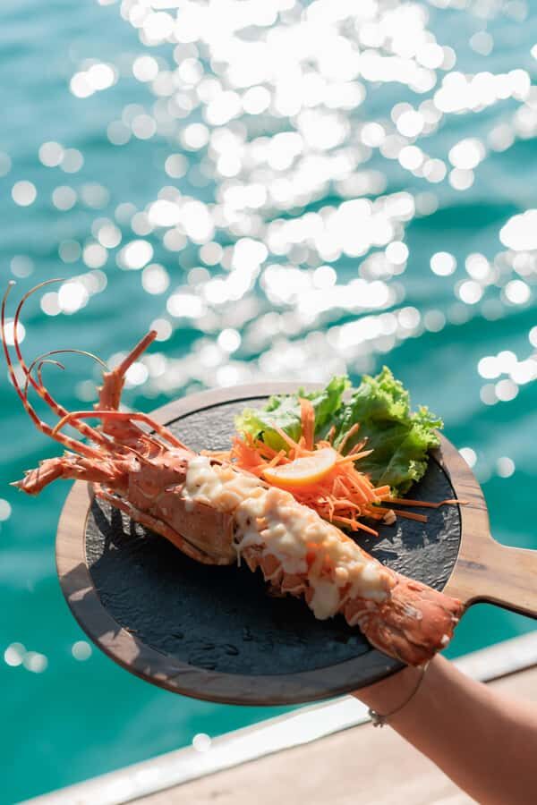 Koh Larn: Private Wooden Boat Charter with Seafood Set - The Itinerary: What to Expect