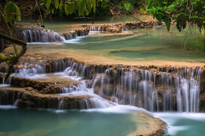 Luang Prabang Alms Giving and Kuang Si Waterfall Private Tour - Delicious Lao Cuisine and Restorative Lunch