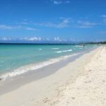 Negril: Seven Mile Beach, Craft Market, and Ricks Café Tour - What Makes This Tour Stand Out?