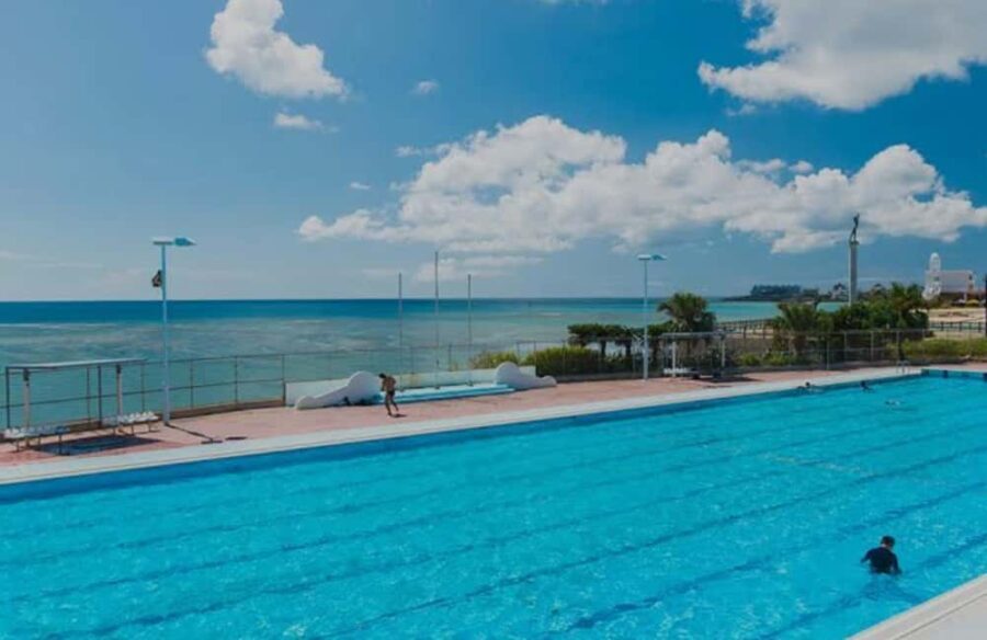Okinawa: Sunset Beach Walk and Swim with Dinner - Swimming in Style: Pool & Ocean Options