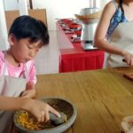 Sanur: Balinese Cooking Class with Optional Market Tour - The Guide and Group Dynamics
