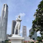 Singapore: City Highlights Tour with Coffee and Kaya Toast - Crossing the Cavenagh Bridge and Passing The Fullerton Waterboat House