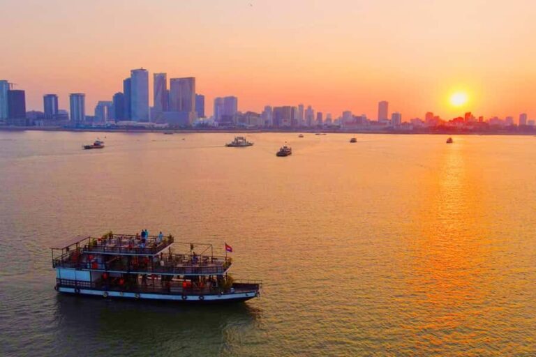 Sunset cruise with unlimited beer, soft drinks & tour guide - An introduction to Phnom Penhs river life from the water