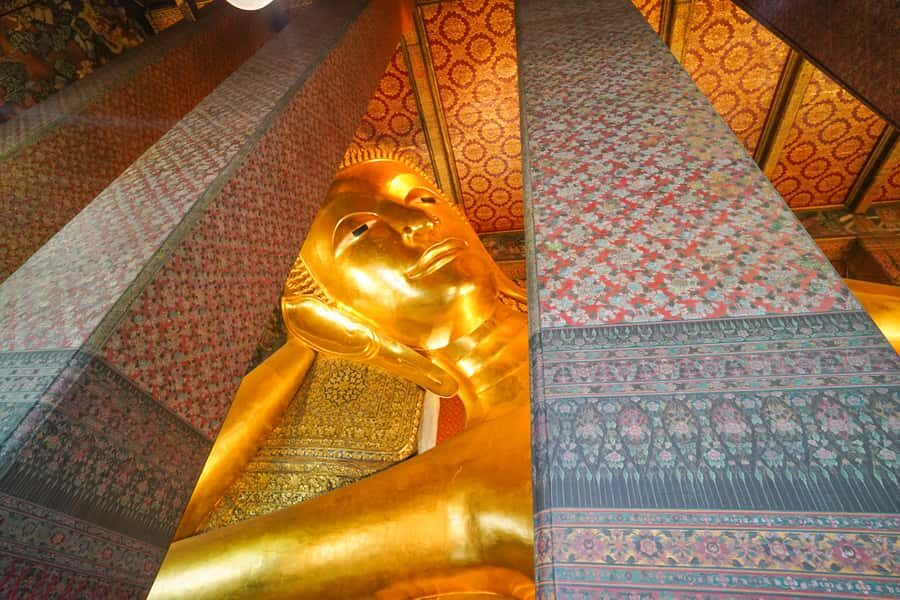 Wat Pho, Wat Arun & Flower Market Walking Tour in Bangkok - Transportation, Timing, and Practical Tips