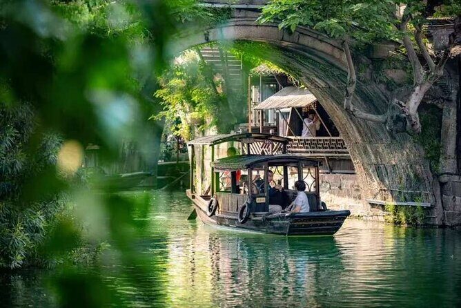 Wuzhen and Xitang Water Town Day Tour with Guide from Shanghai - Exploring Wuzhen: A 1,300-Year-Old Water Town
