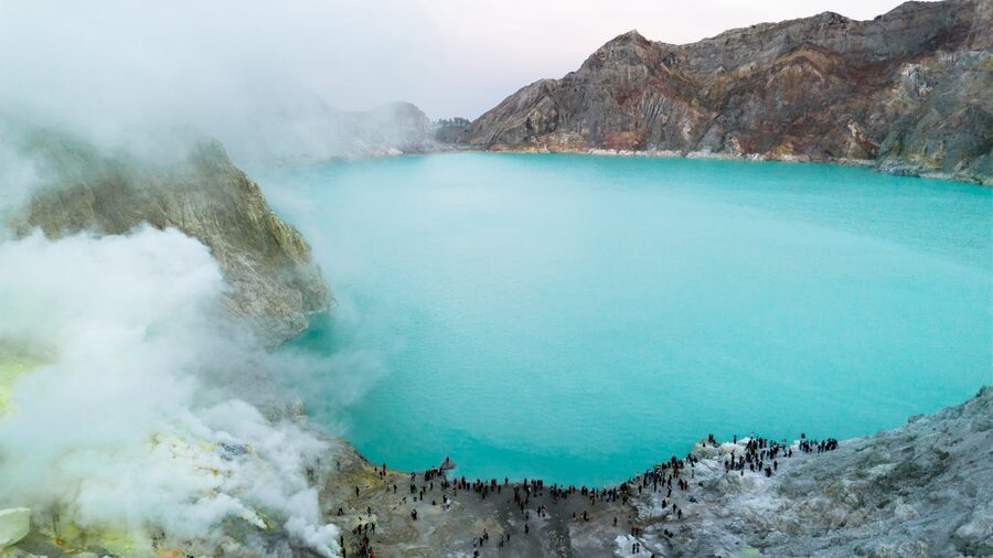 Sulfur fumaroles steaming from Ijen crater