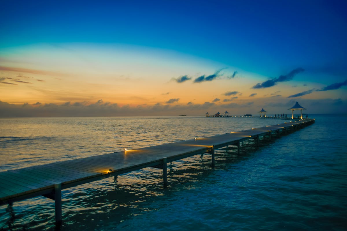 Tropical jetty with boats