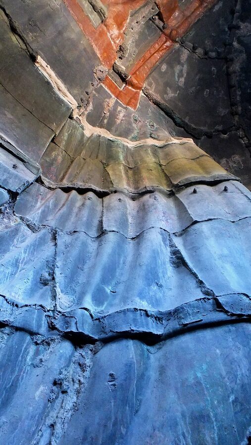 Inside the hollow Great Buddha at Kotoku-in, where you can climb up and see the bronze seams