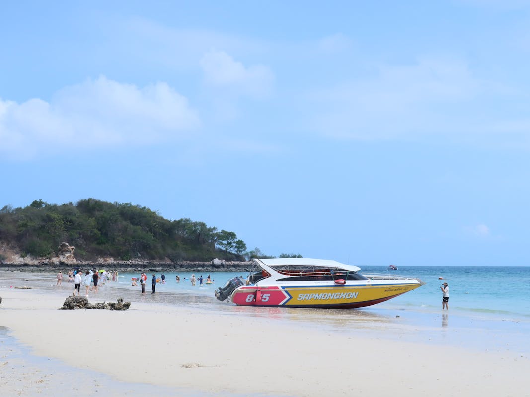 Speedboat cutting through tropical water