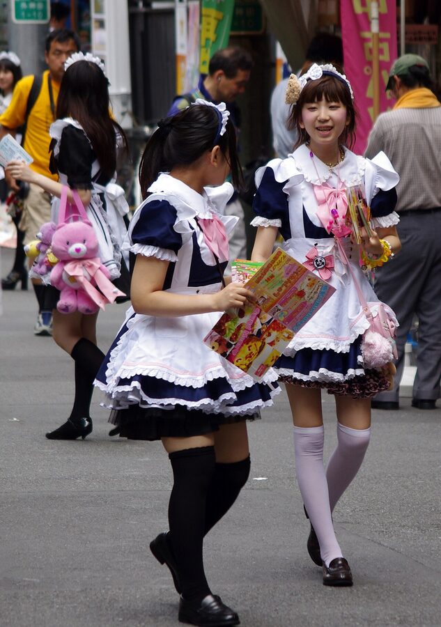 Maids distributing flyers in Akihabara Tokyo street