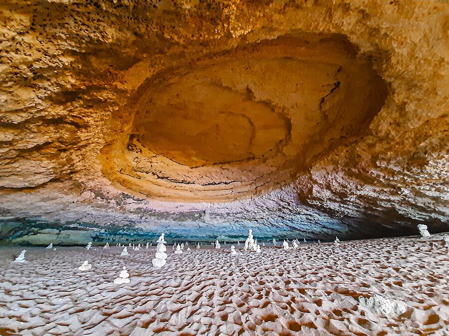 Sea cave with circular skylight at Algar de Benagil, Portugal