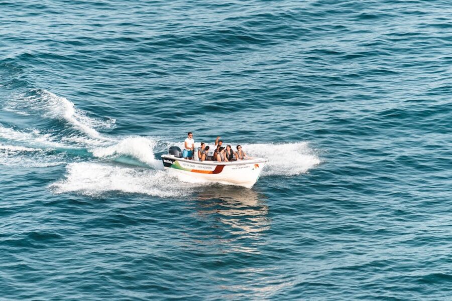 Group enjoying a speedboat ride on the Atlantic, Faro District, Portugal