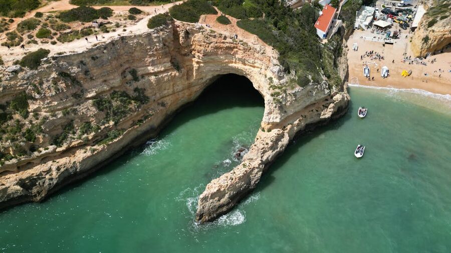 Aerial view of Benagil Cave skylight and beach in Algarve, Portugal