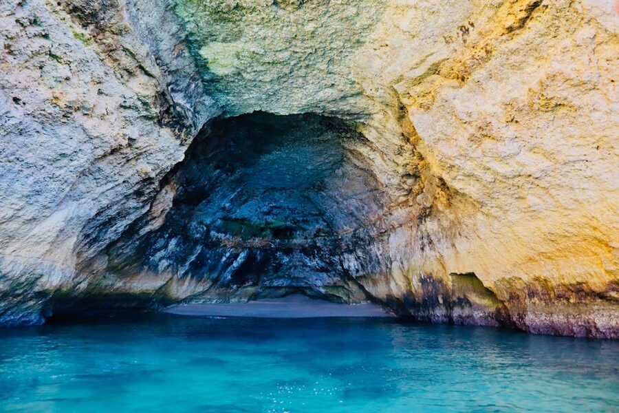 Sea cave with sparkling blue waters near Carvoeiro, Algarve