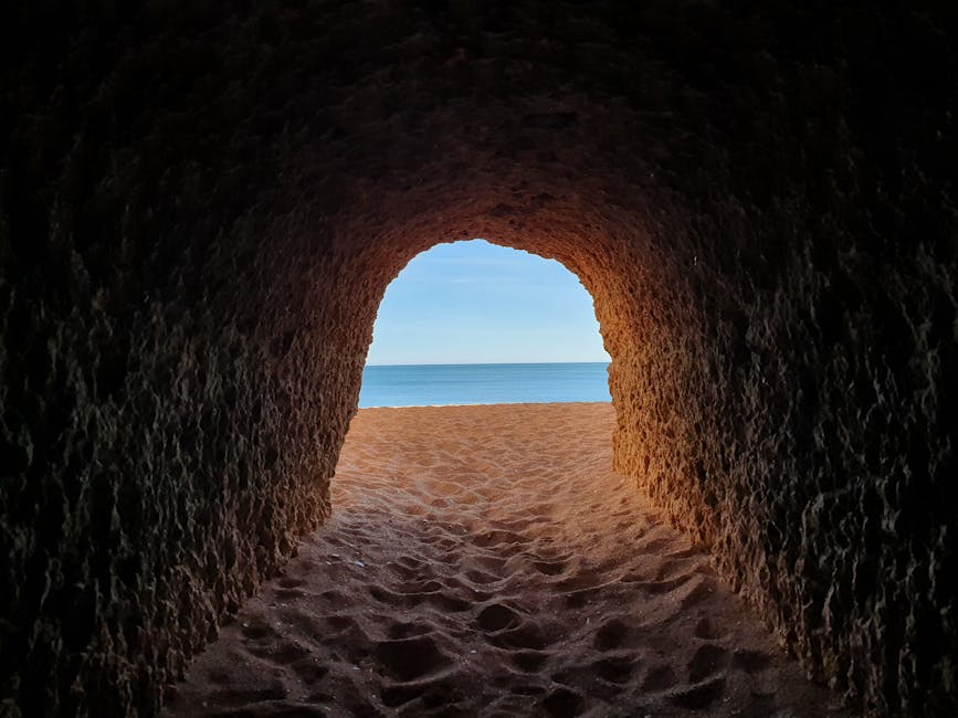 Cave tunnel leading to Algarve beach