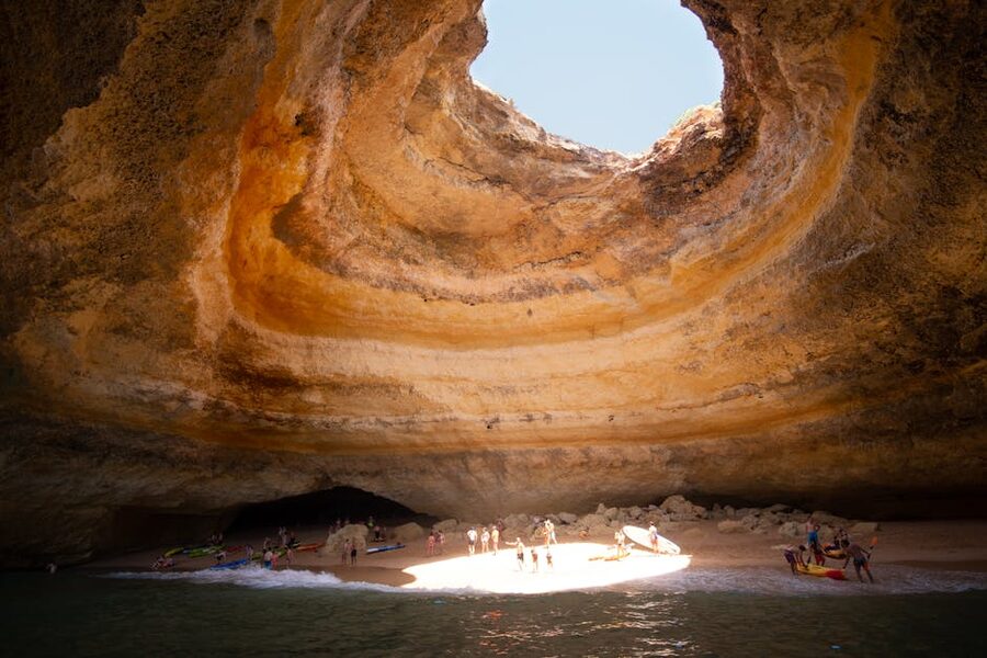 Benagil Cave interior with circular skylight in the rock dome, Algarve