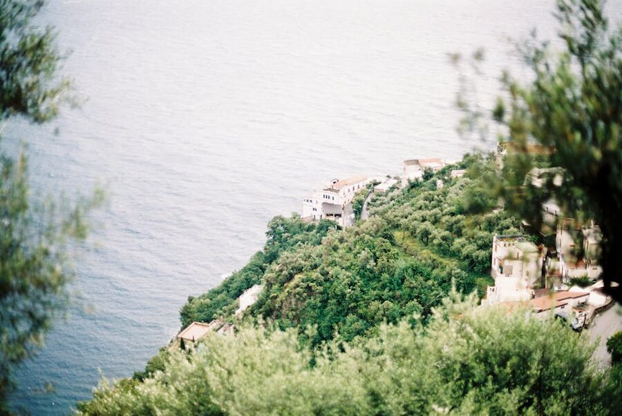 Lush green hills meeting the Tyrrhenian Sea on the Amalfi Coast Italy