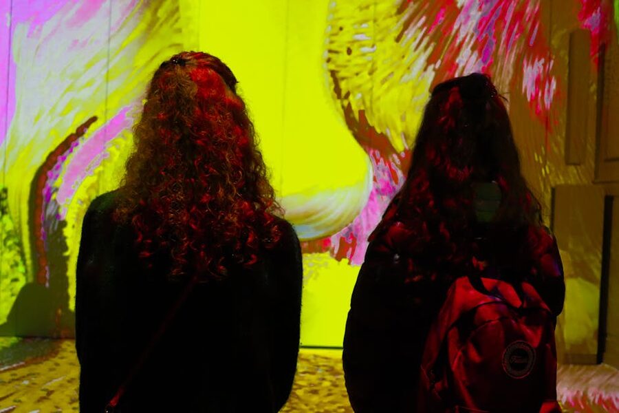 Visitors at a Fabrique des Lumières digital art exhibit Amsterdam