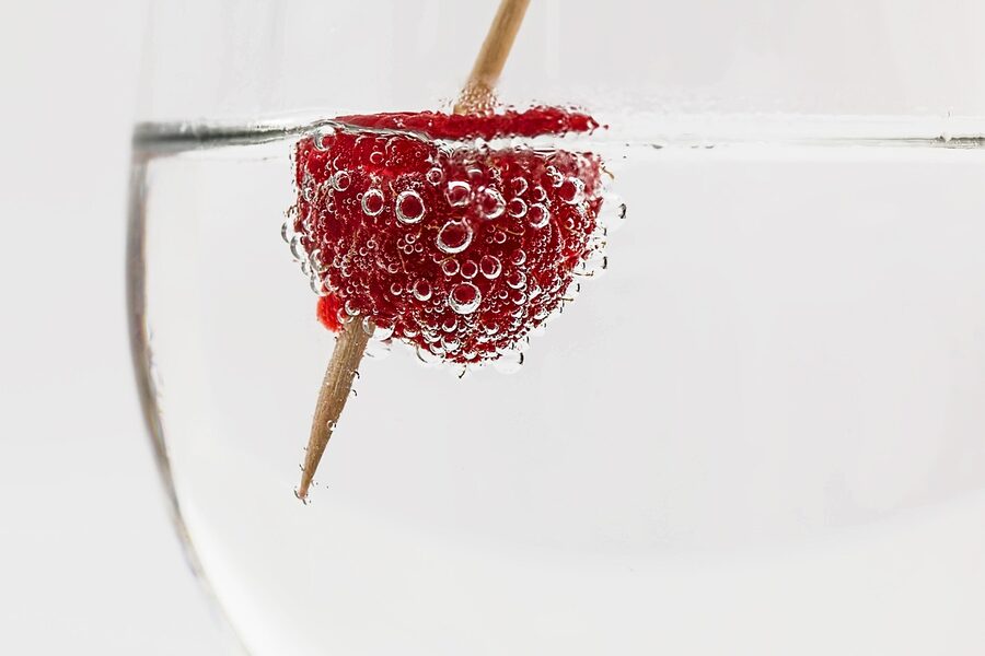 Vodka in a small cold cocktail glass against a frosted background