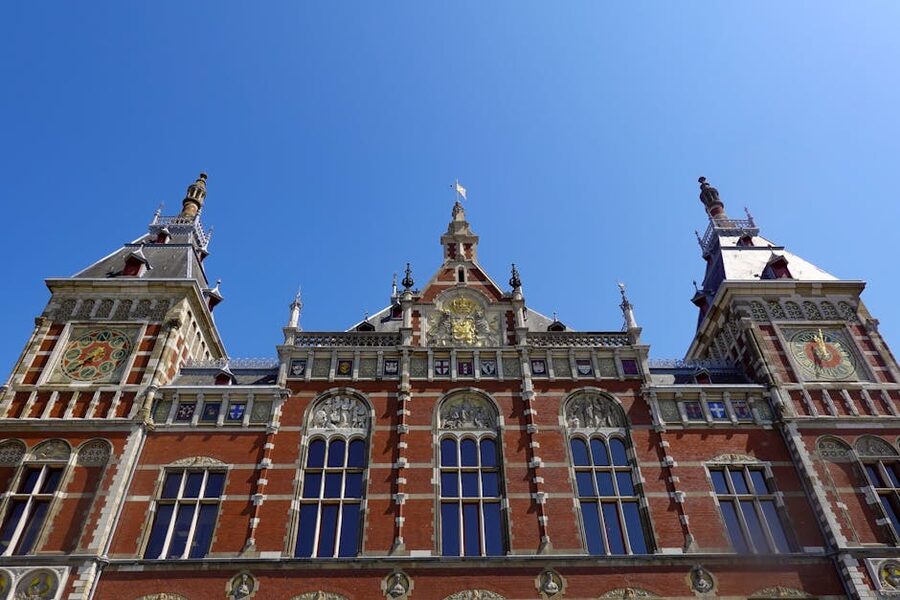 Amsterdam Centraal Station facade with clock tower