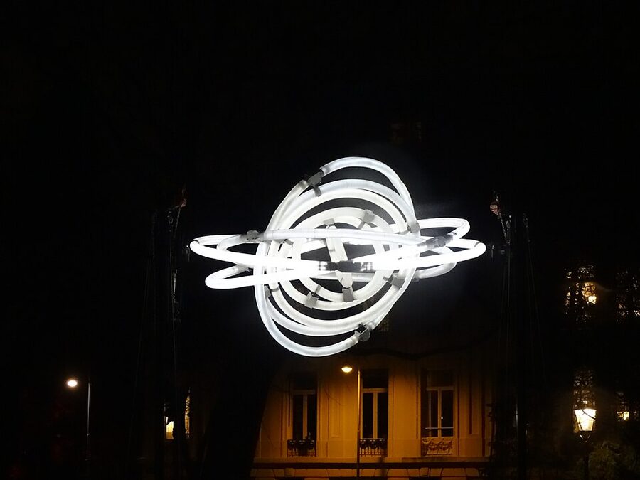 Amsterdam Light Festival canal installation reflected on water