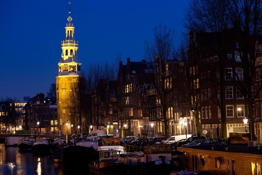 Amsterdam illuminated bridge in the evening