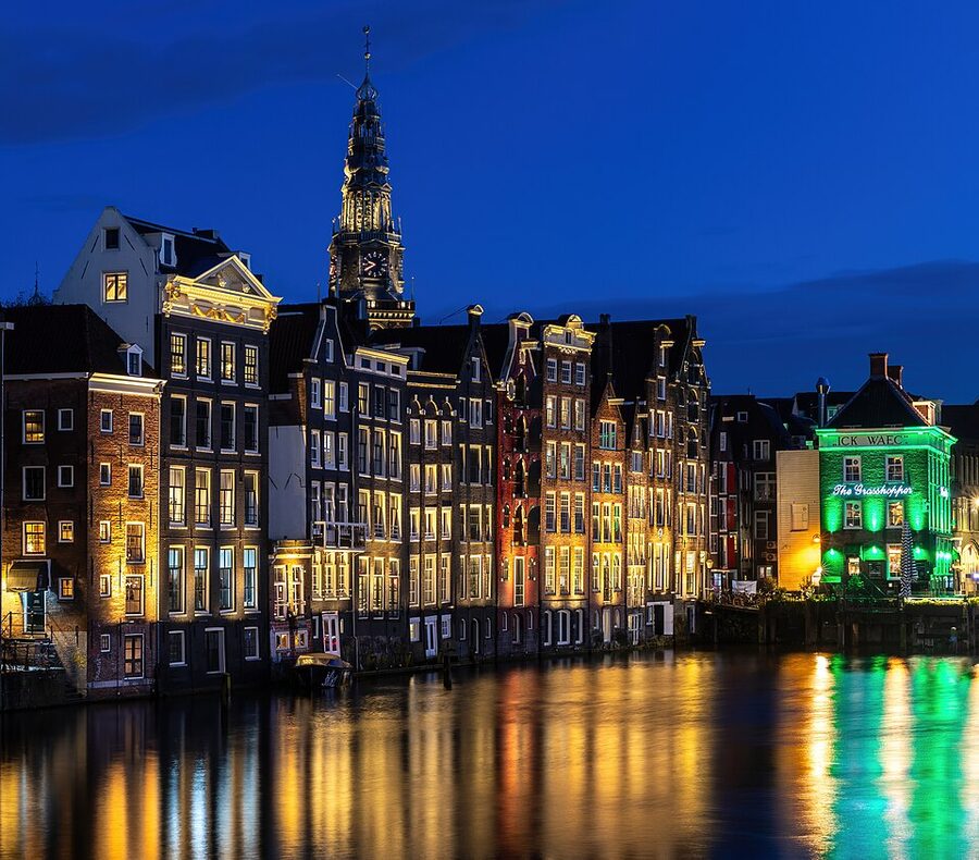 Oude Kerk and canal houses at blue hour in Amsterdam
