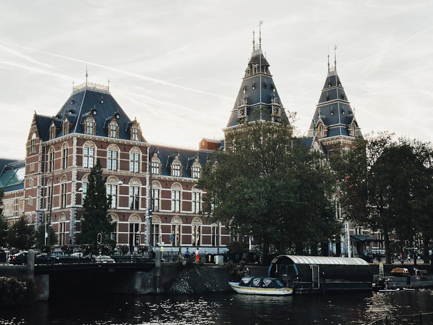 Rijksmuseum facade seen from the canal Amsterdam
