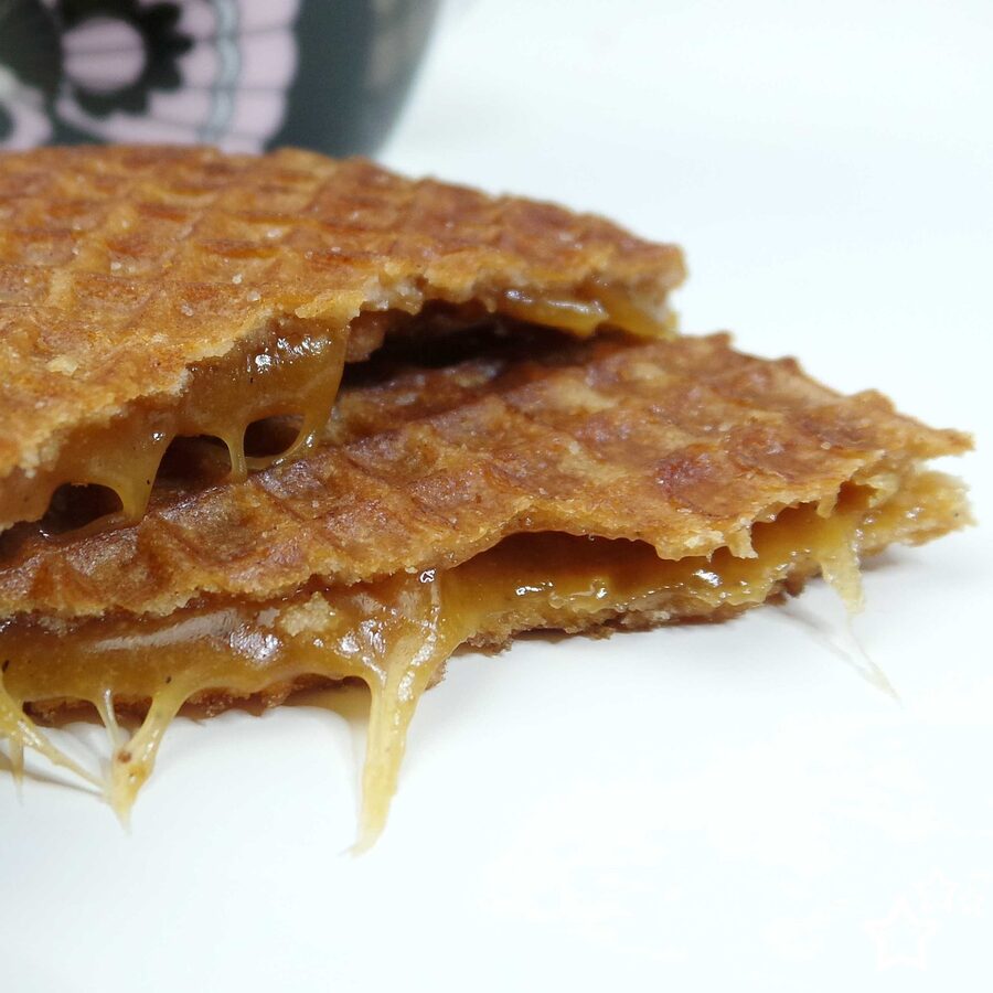 Single stroopwafel with caramel filling close up