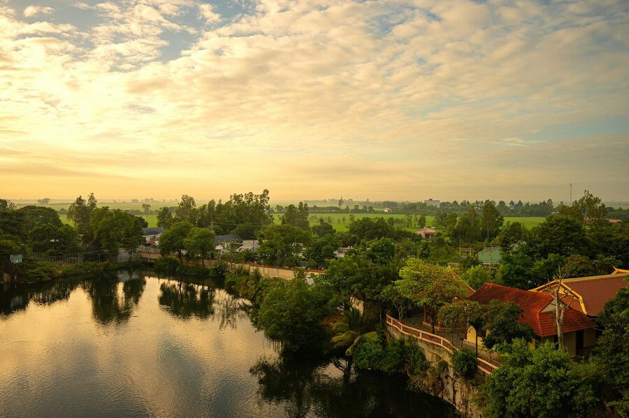 Sunrise over a village in An Giang province in the Mekong Delta