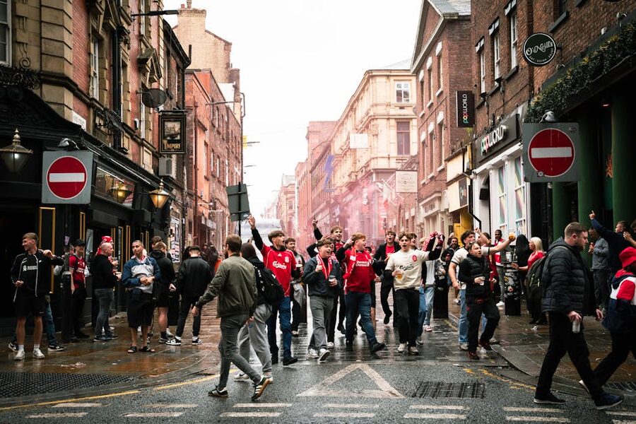 Liverpool football fans in the street celebrating