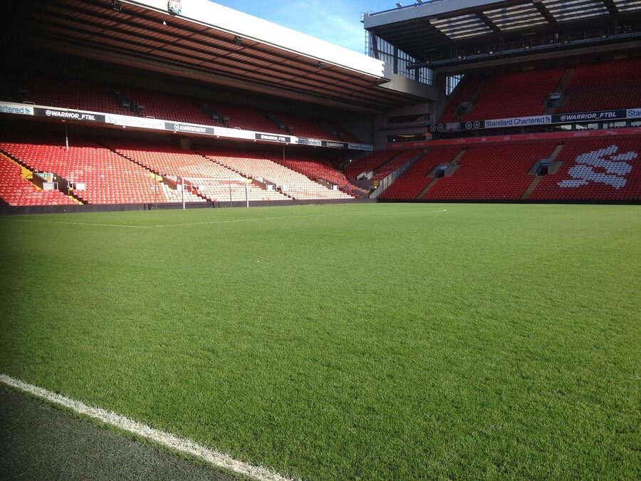 Anfield pitch and empty stands turf and seats