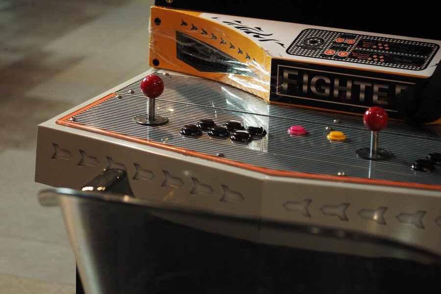 Close-up of a vintage arcade game control panel