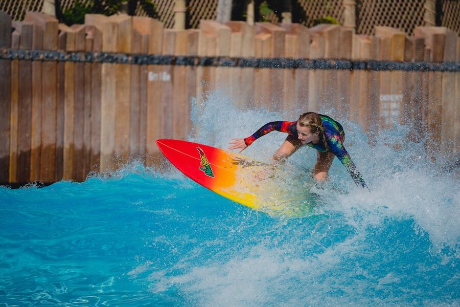 Surfer riding a clean artificial wave in a wave pool
