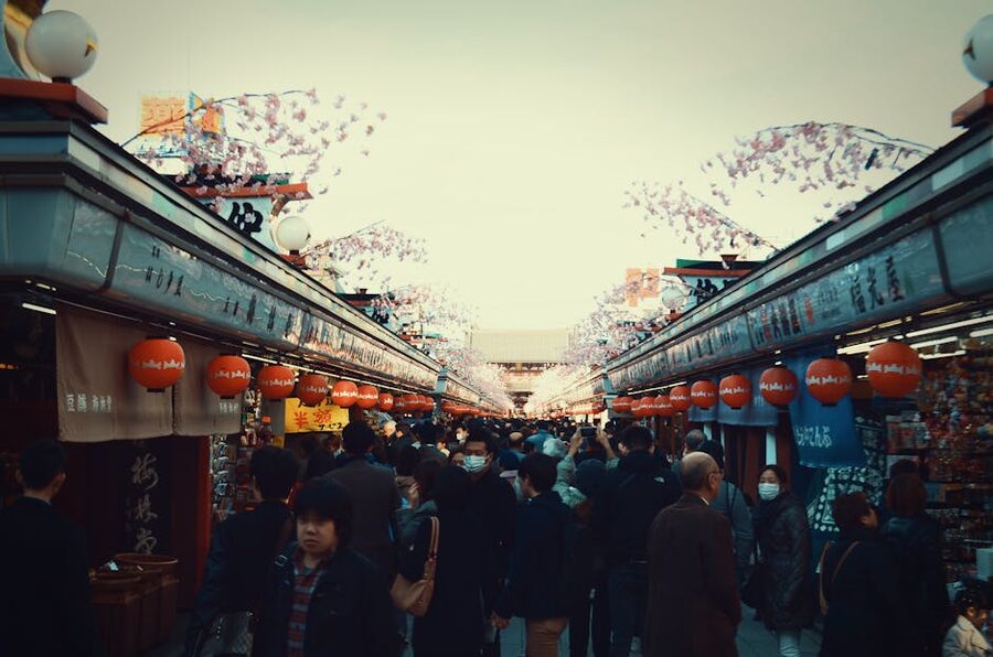Asakusa street scene under cherry blossoms in Tokyo