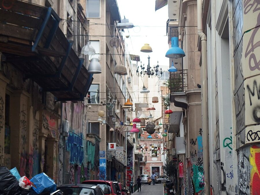 Odos Pittaki Psyrri street with hanging lamps art installation