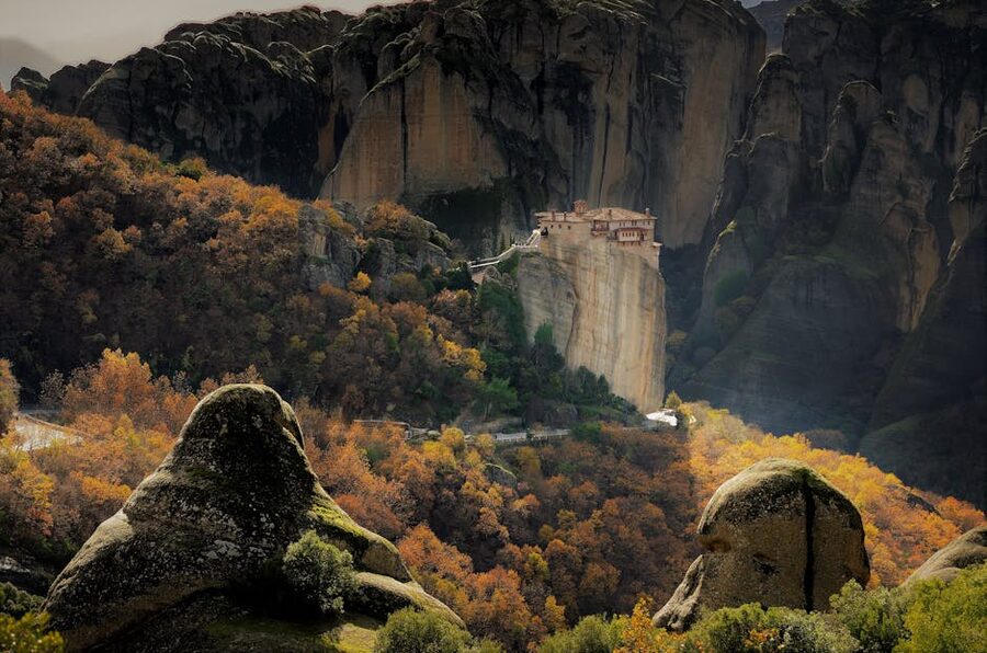 Meteora autumn foliage cliff
